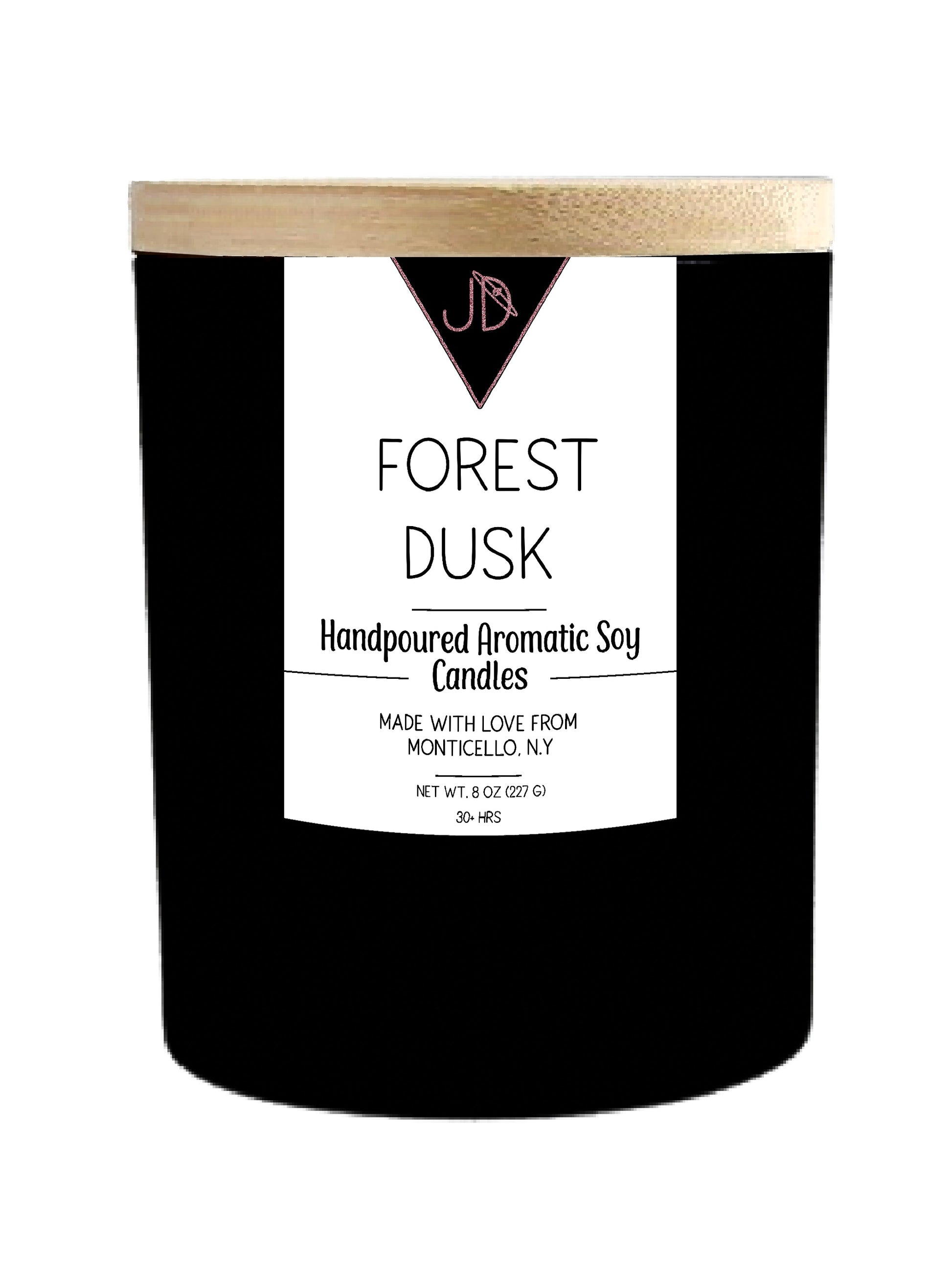 The forest at last light — cold air, dying embers, that stillness right before the stars come out. Forest Dusk opens with crisp fir needles and smoked wood, warming into clove, peppercorn, and cedarwood, with a soft campfire-sweetness of burnt marshmallow woven through. It settles into a deep, grounding base of patchouli, sandalwood, amber, and musk.

This one is pure comfort — the scent of coming inside after a long walk, wrapping up in a blanket, and finally exhaling.

Hand-poured in small batches in Mont