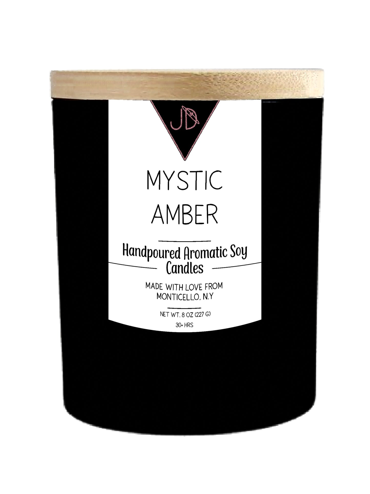 Exotic, warm, a little otherworldly. Mystic Amber opens with fresh green top notes, moving into warm spice, earthy patchouli, and a delicate bloom of lily. It settles into a rich base of amber and sandalwood, sweetened with soft vanilla and musk.

This one is deep and grounding — perfect for candle-lit rituals, tarot pulls, or any evening that calls for a little mystery.

Hand-poured in small batches in Monticello, NY using clean-burning soy wax and a cotton wick, Mystic Amber burns true to scent for 30+ ho