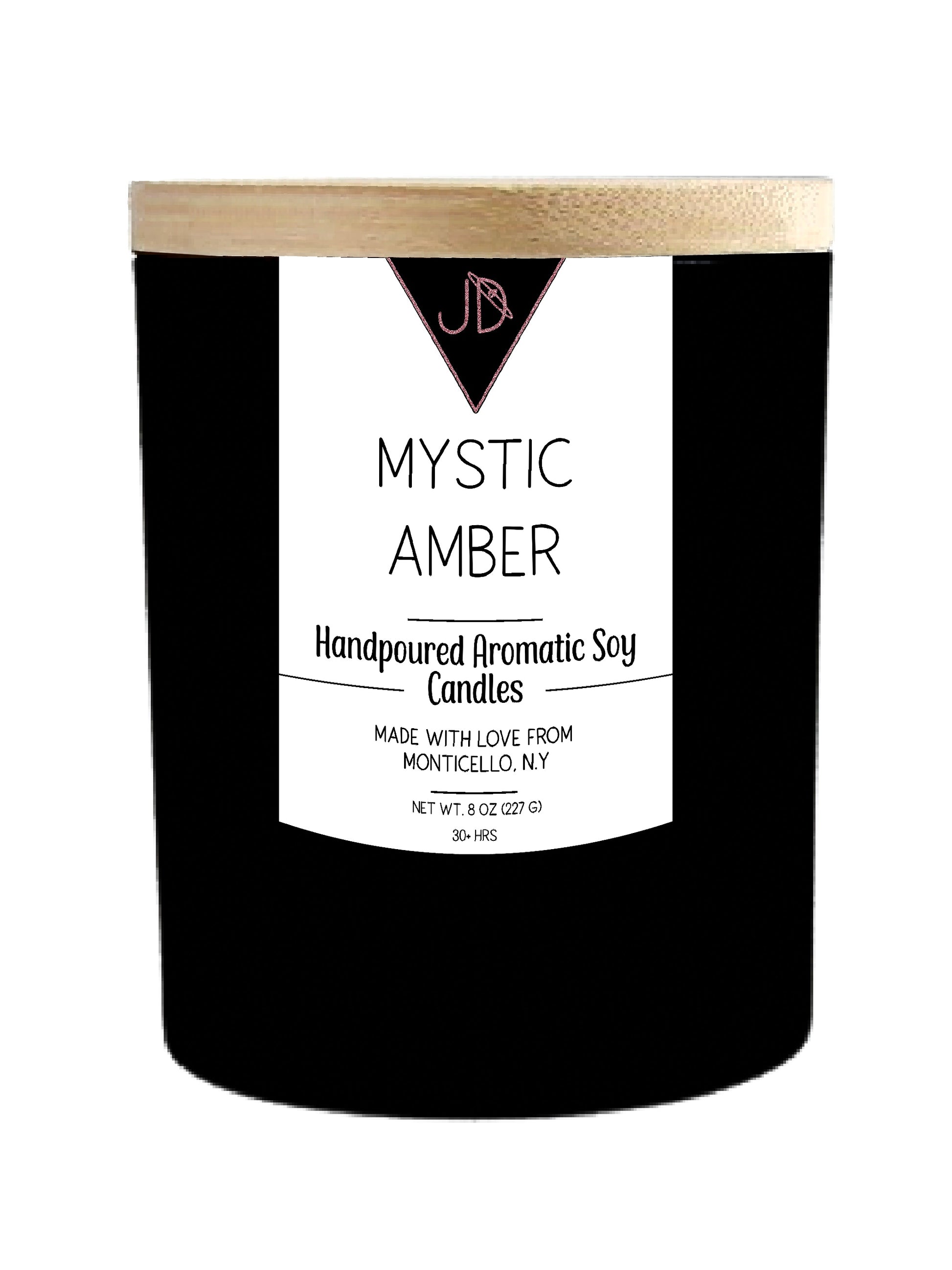 Exotic, warm, a little otherworldly. Mystic Amber opens with fresh green top notes, moving into warm spice, earthy patchouli, and a delicate bloom of lily. It settles into a rich base of amber and sandalwood, sweetened with soft vanilla and musk.

This one is deep and grounding — perfect for candle-lit rituals, tarot pulls, or any evening that calls for a little mystery.

Hand-poured in small batches in Monticello, NY using clean-burning soy wax and a cotton wick, Mystic Amber burns true to scent for 30+ ho