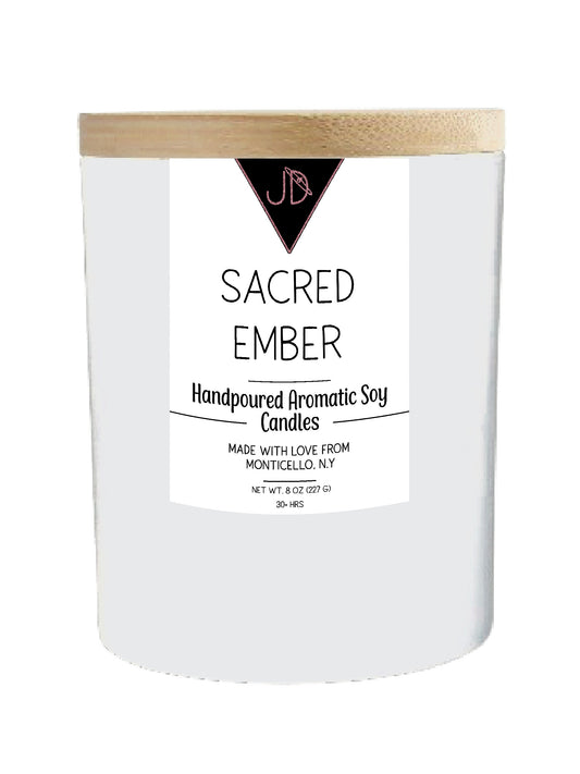 
Warm spice curling through smoke, like an old ritual passed down. Sacred Ember opens with black pepper, clove leaf, and nutmeg, softened by a calming layer of lavender. It settles into a rich, resinous base of cedarwood, tonka bean, patchouli, vanilla, amber, sandalwood, and olibanum.

This one is deep and enveloping — perfect for grounding practices, meditation, or simply slowing down at the end of the day.

Hand-poured in small batches in Monticello, NY using clean-burning soy wax and a cotton wick, Sa