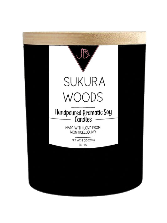 Delicate blossoms meet deep, lush woods. Sukura Woods opens with sweet cherry blossom and freesia, brightened with a whisper of spice, before unfolding into a dramatic base of sandalwood, oak, and fruit wood. Clear musk and dark amber round it out with a soft, lingering finish.

Elegant and a little sensual, this one bridges soft florals with grounded, woodsy depth — beautiful for any season.

Hand-poured in small batches in Monticello, NY using clean-burning soy wax and a cotton wick, Sukura Woods burns tr
